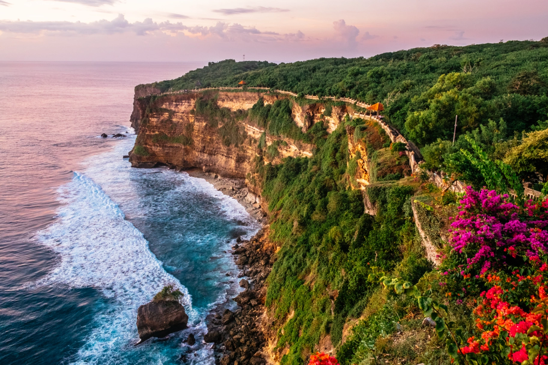 Uluwatu cliff coastline at sunset
